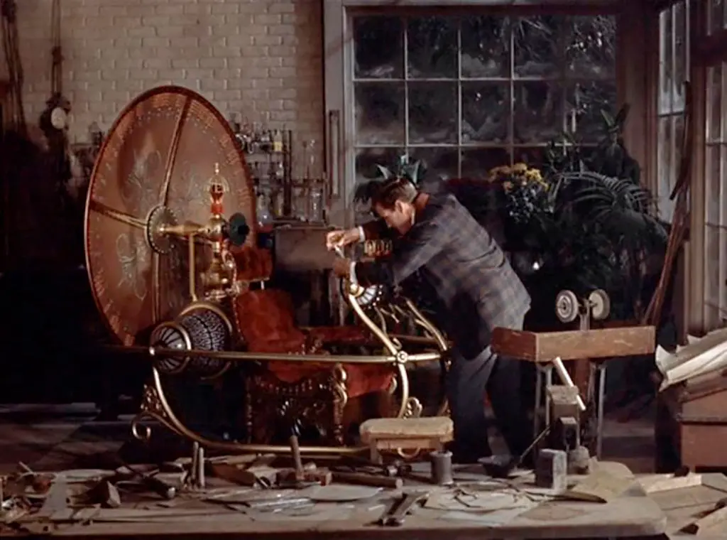 Un homme répare la machine à explorer le temps.