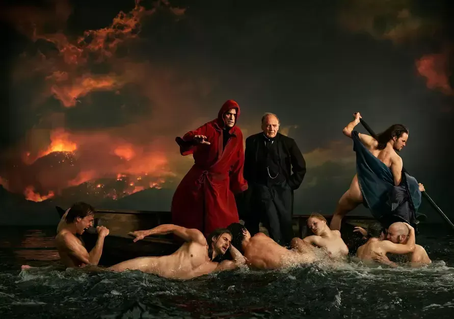 Un homme, en toge rouge, descend aux enfers avec Caron, on dirait un tableau. L'image est tirée du film The House That Jack Built